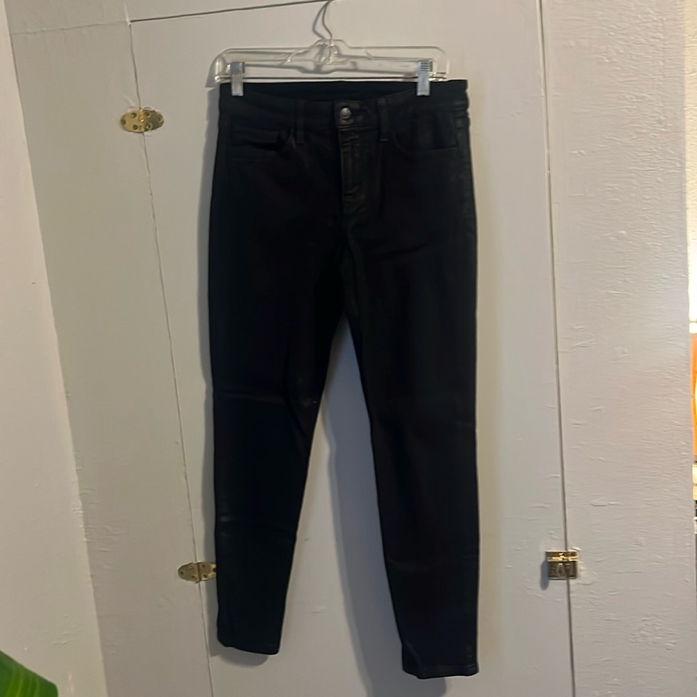 Black waxed Joe’s skinny ankle jeans
